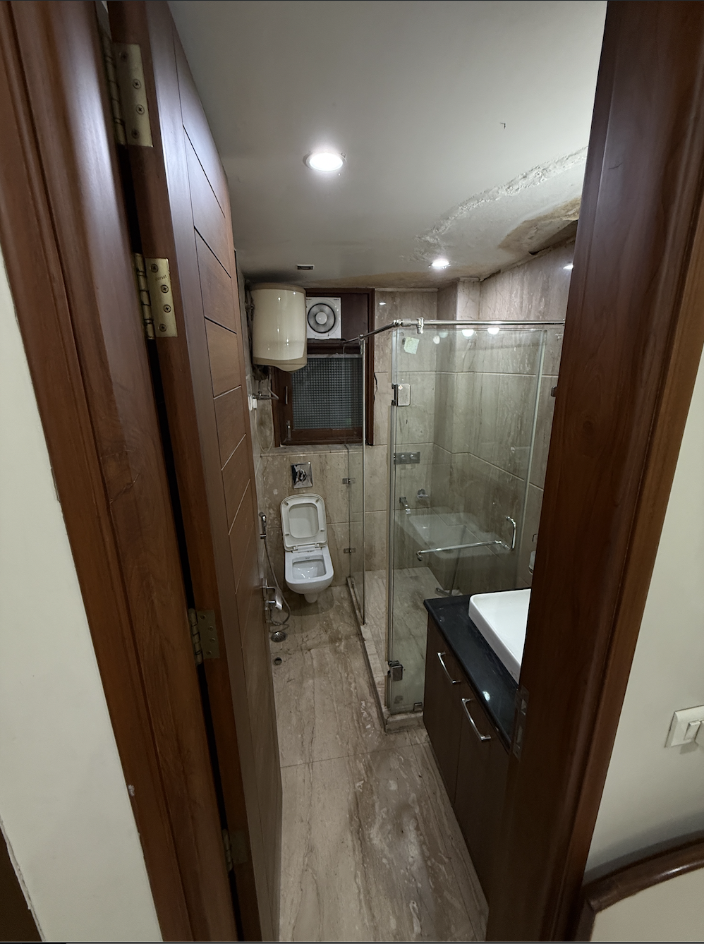 Bathroom with enclosed shower area