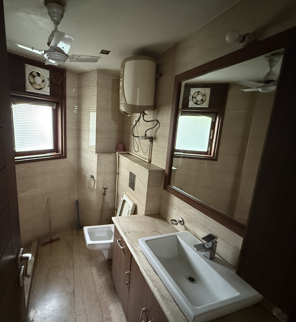 Bathroom with sink and water heater