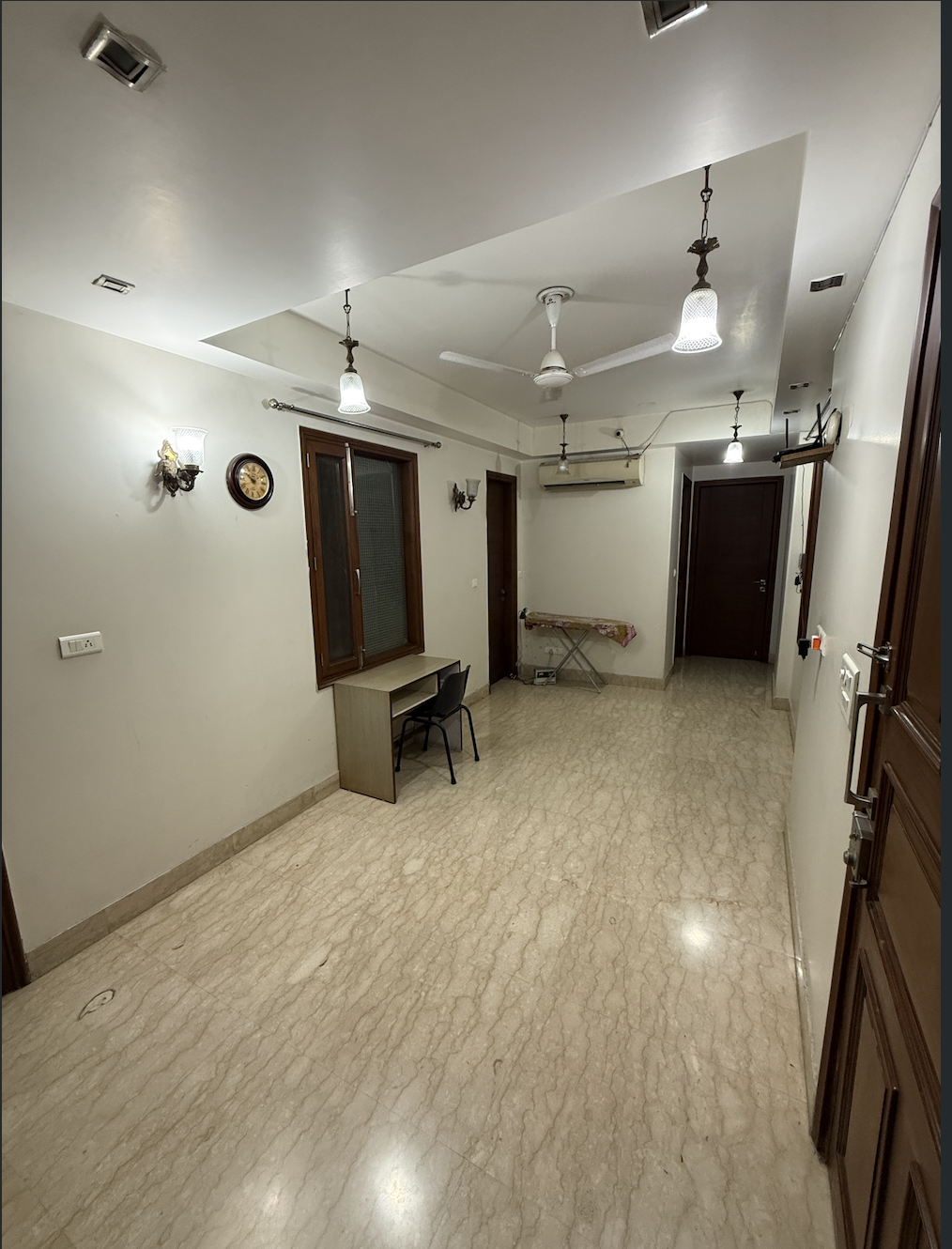 Well maintained interior corridor with study desk